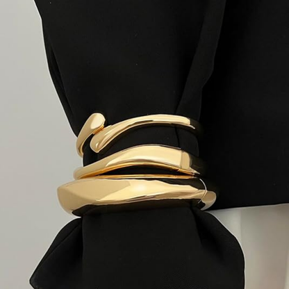 Filippa – Eleganta guldarmband med modern organisk form