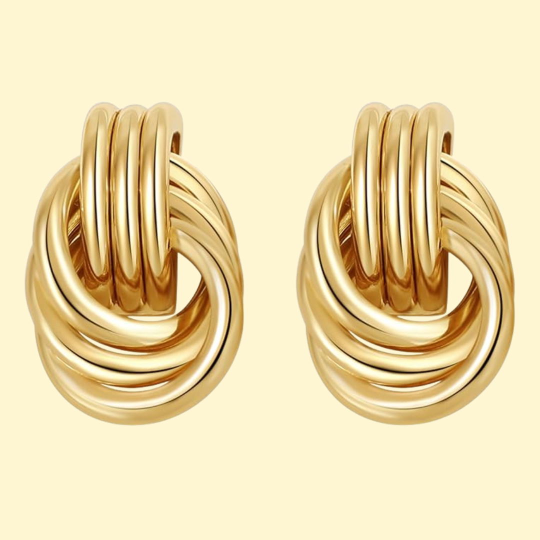 Freja – Eleganta flätade guldörhängen med statement-design