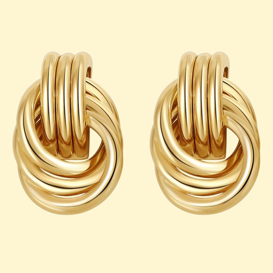 Freja – Eleganta flätade guldörhängen med statement-design